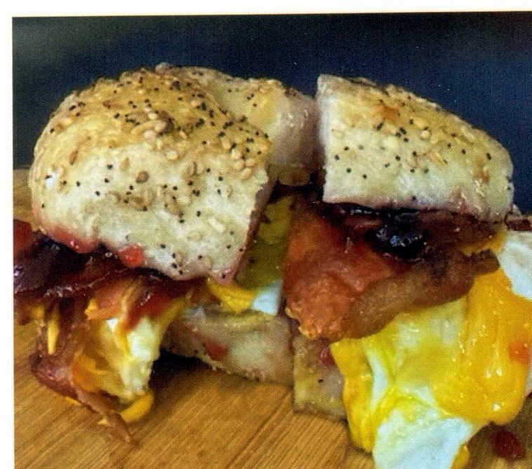 Bacon, egg and cheese breakfast sandwich on an everything bagel