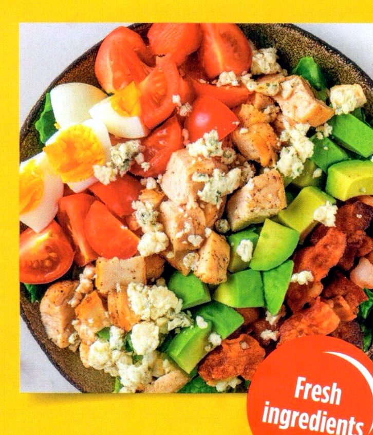 Cobb salad with avocado, bacon, tomatoes and hard boiled egg