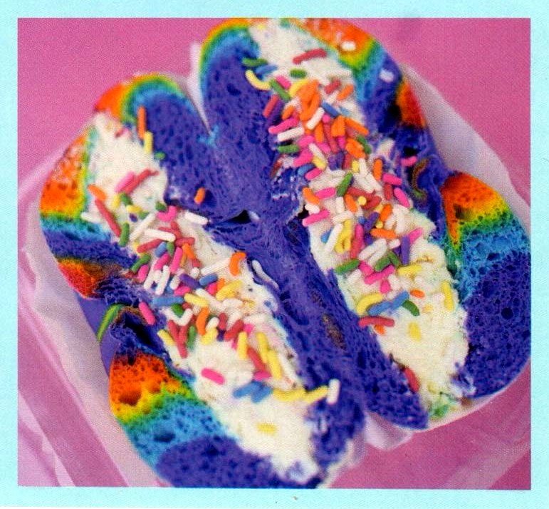 Rainbow Kragel with whipped cream and sprinkles